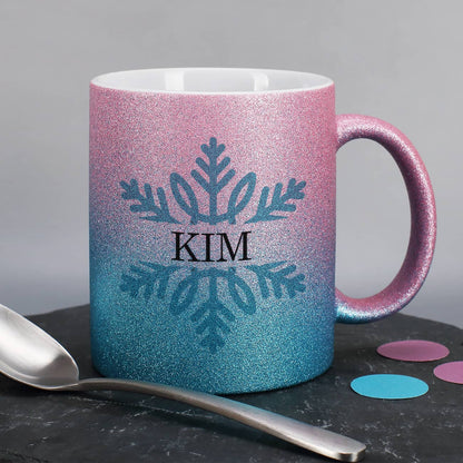 Pink / blaue Glitzertasse zu Weihnachten mit Schneeflocke und Wunschtext