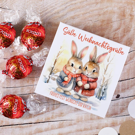 Kleiner Weihnachtsgruß in Form von Schokolade in personalisierter Verpackung