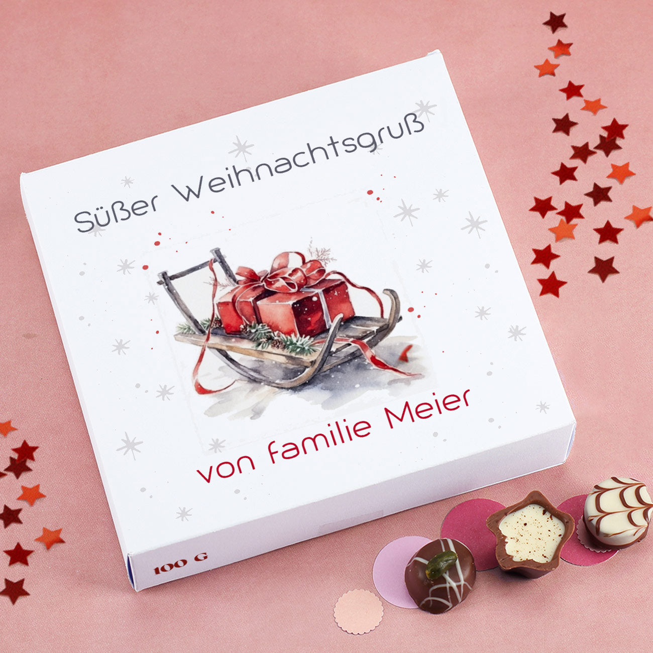 Weihnachts-Pralinés von Lindt und Ihrem Text und weihnachlichem Schlitten