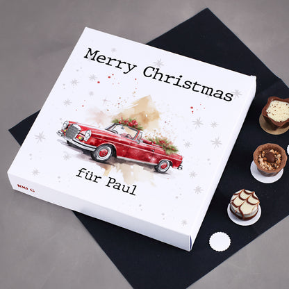 Weihnachts-Pralinés von Lindt und Ihrem Text und weihnachlichem Mercedes Cabrio