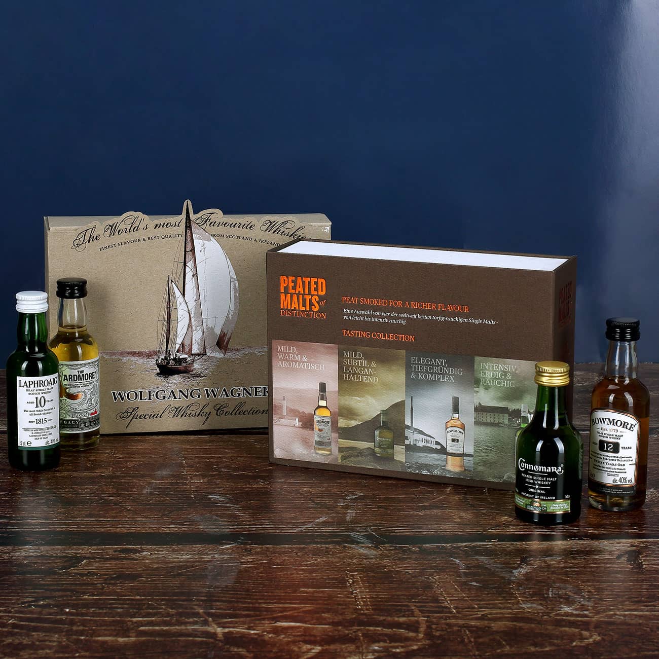 Whisky-Kollektion mit 4 der weltbesten torfig-rauchigen Single Malts in bedruckter Geschenkverpackung mit Wunschname und Segelschiff