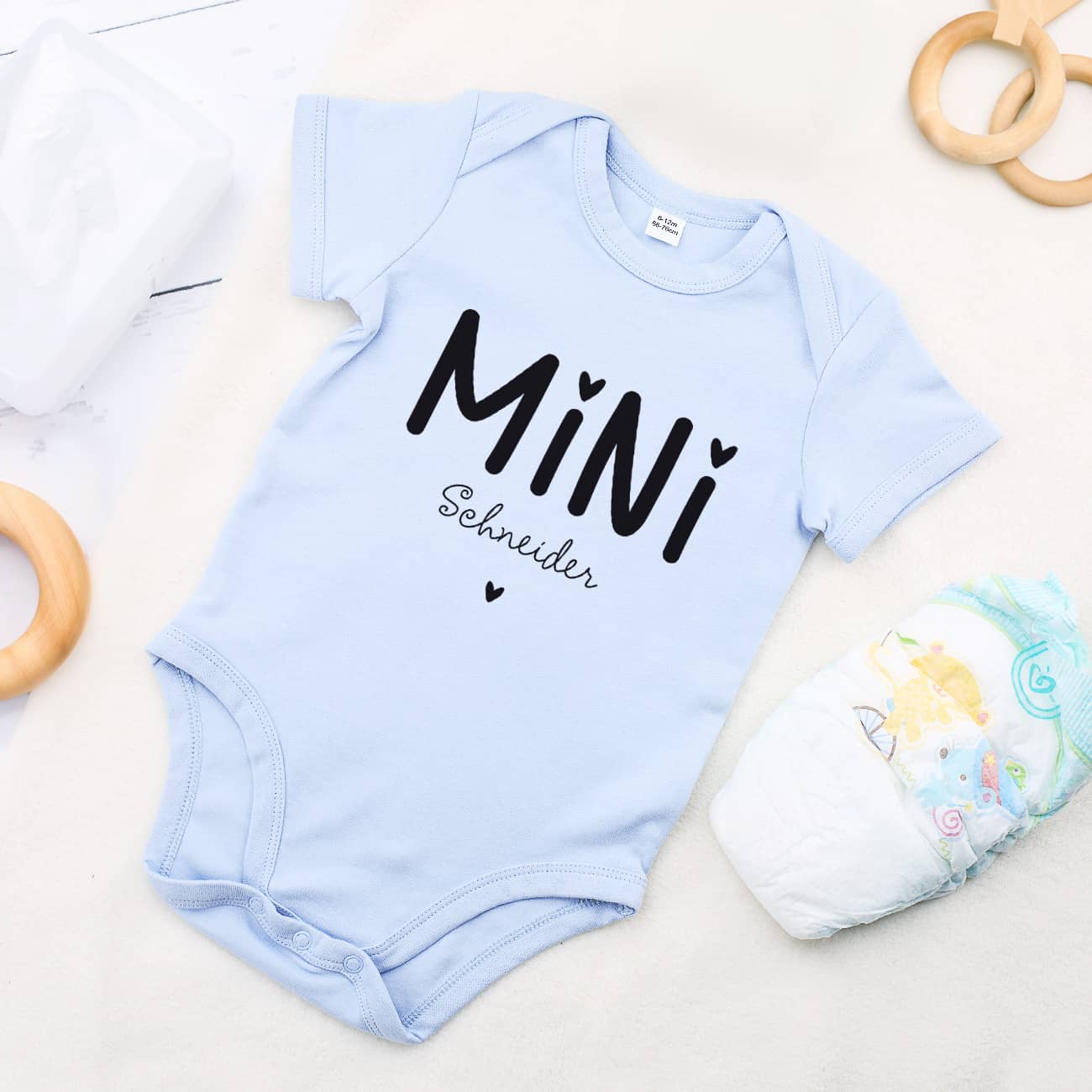 Babybody in hellblau mit Name für MINI - Jungen