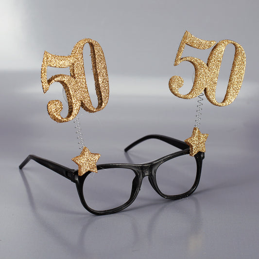 Brille mit goldenen 50er Zahlen