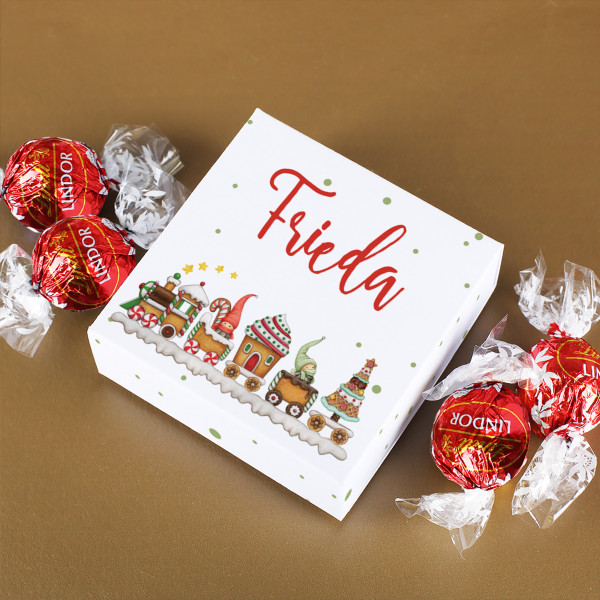 4 Lindorkugeln in Geschenkverpackung mit Wichtel Weihnachtszug Motiv